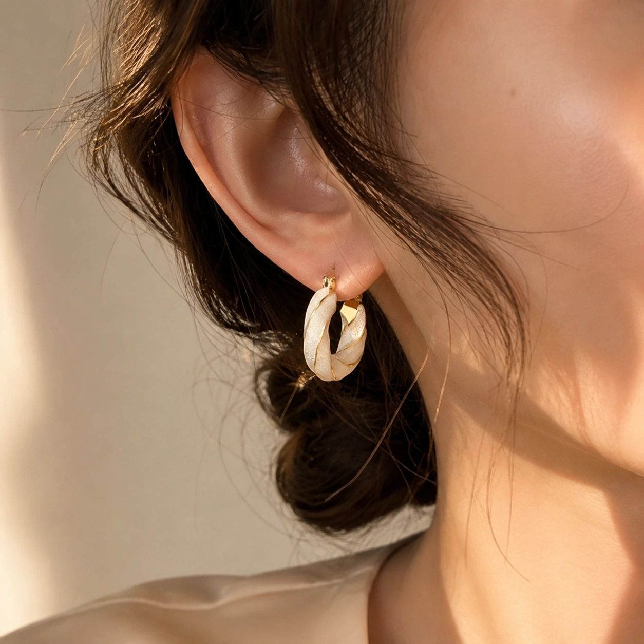 White Enamel Twist Hoop Earrings – Elegant Gold Tone Jewelry